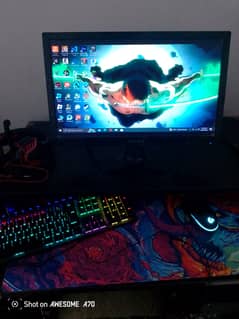 Gaming PC with monitor and table with mouse and keyboard