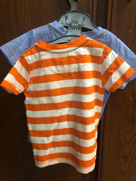 2 shirts price. . . size 12 to 18 month brand mother care 1