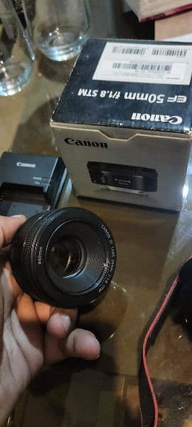 Canon 4000 D + 50 mm brand new Blur lens 5