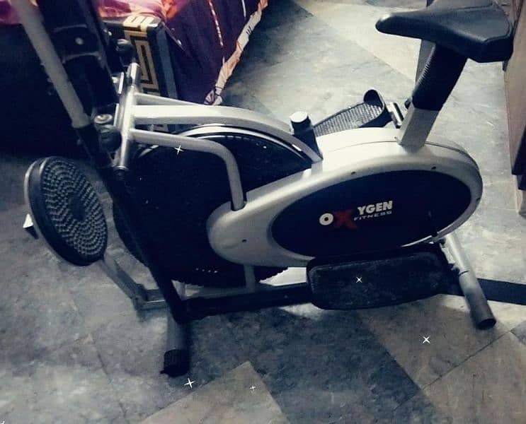 Exercise Bike ( Three in one
Cycle
,Twister
, Dumbles set) 4
