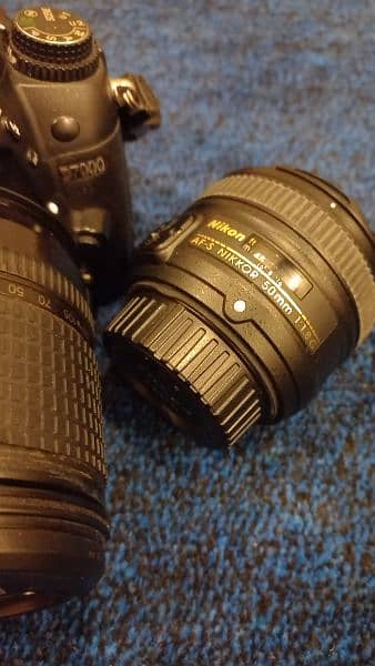 Nikon D7000 with 2 lense, (50mm 1:1.8 & 13.135mm). 6
