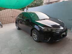 Toyota Corolla gli 2014 almost totally 99% genuine lahore number