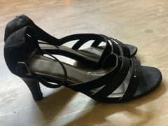 Black branded heel for sale in excellent condition
