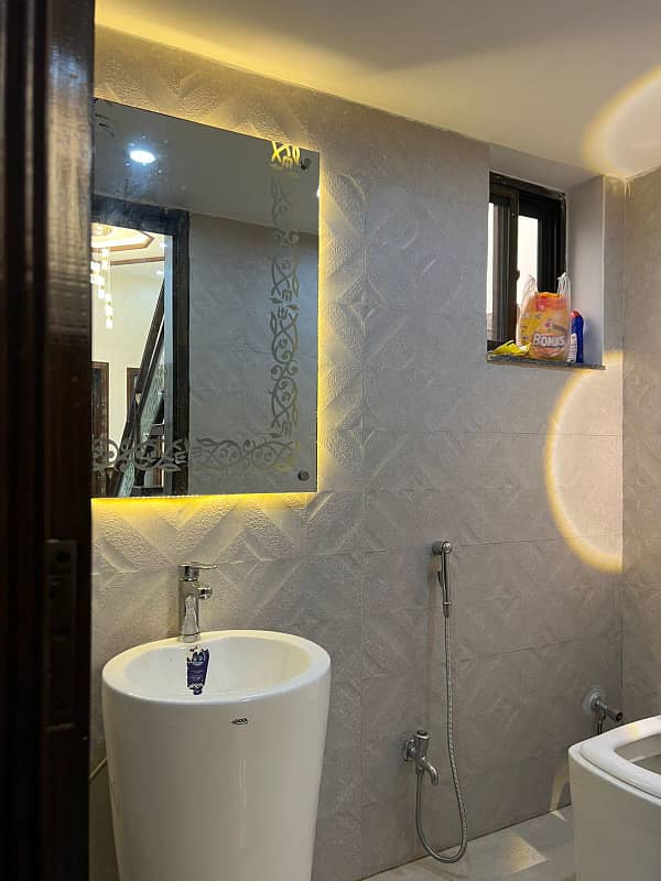 5 Marla Brand New Beautiful House For Sale In Sector D Bahria Town Lahore 13