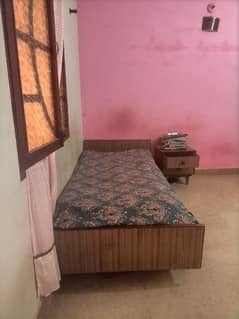Wooden single bed for urgent sell