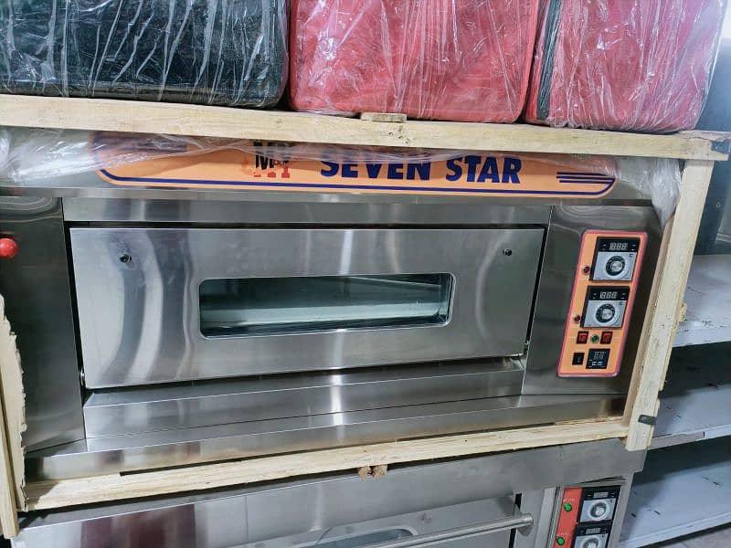 dough mixer, pizza oven seven star, prep table, fryer, food bags 2