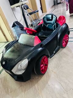 kids battery car with new battery all ok working condition