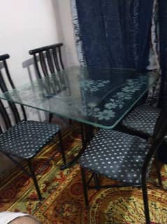 dining table with four iron chair