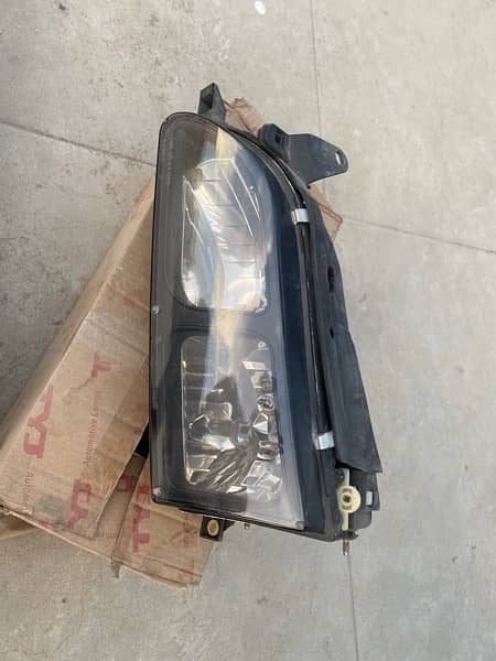 Indus Corolla ae101 front grill and Canadian headlight 2