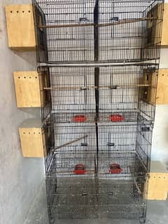 Cages for sale with boxes and drinkers