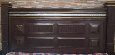 wooden bed with corner tables available in good condition.
