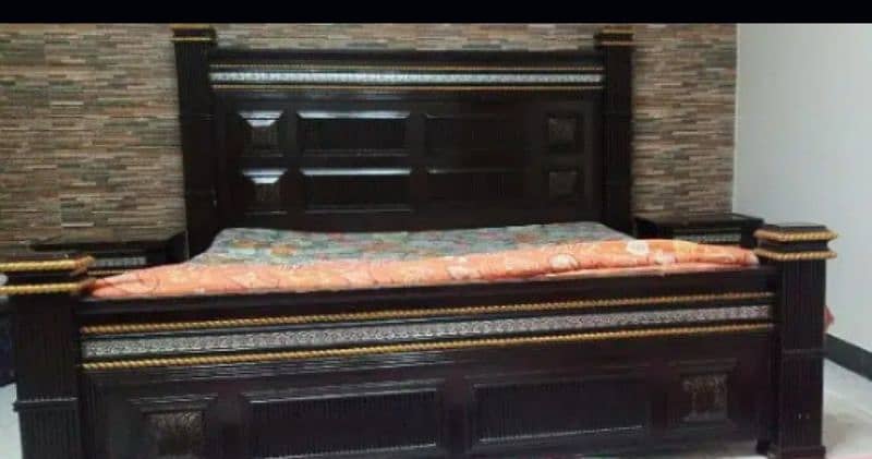 wooden bed with corner tables available in good condition. 2