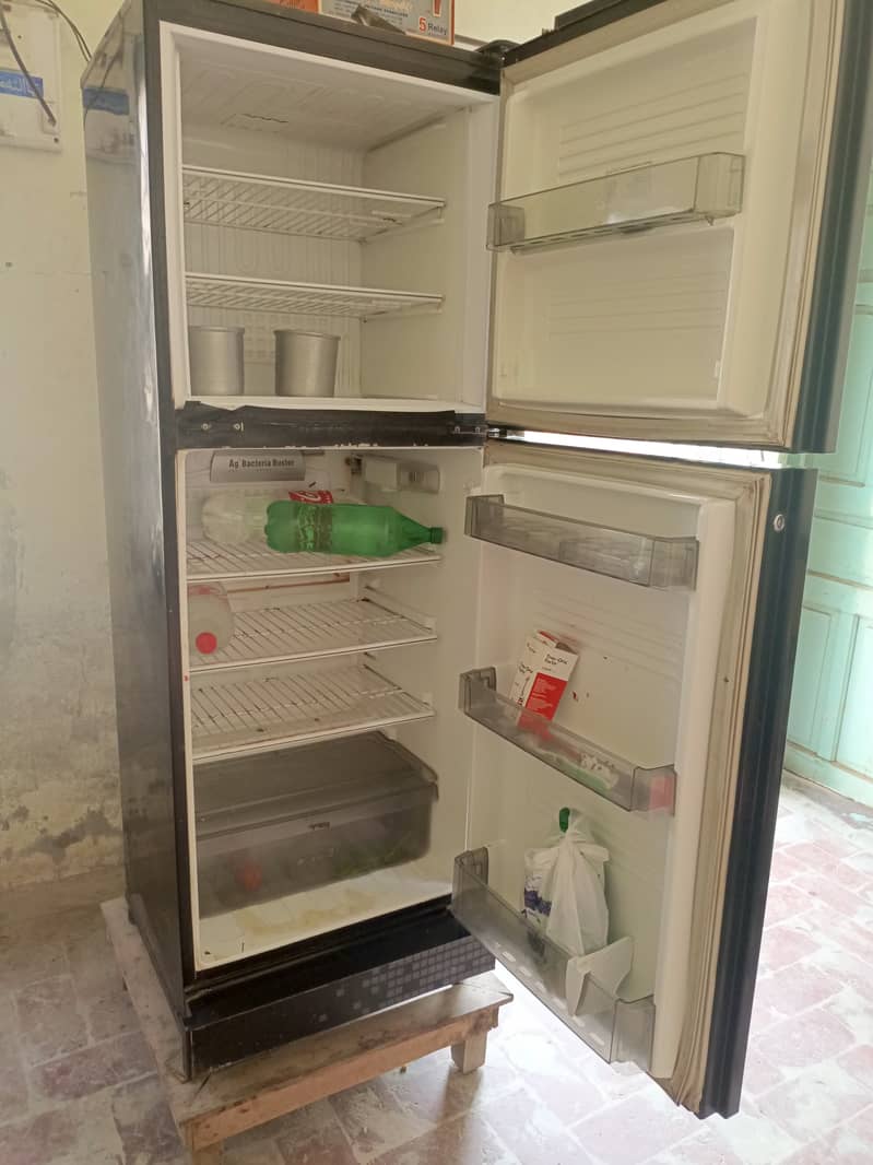 A medium size refrigerator. 6