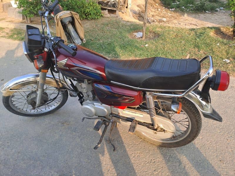 Honda 125 Red Colour With Number 2
