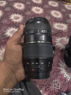 tamron 70-300mm for canon with 2 caps 1 hood ef lens