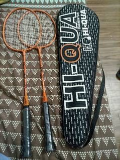2 badminton rackets and 1 bag