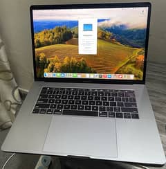 Macbook Pro 2018 model, 15" screen, 16 GB RAM, Intel Core i9