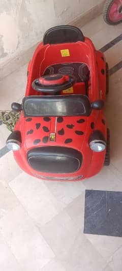 baby car with charger in working condition