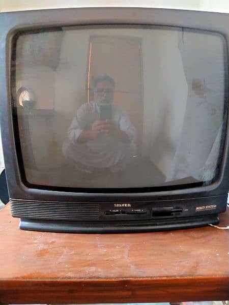 Silver old model tv 0