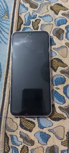 Samsung A14  only 6 months used with box and 2 phone covers free