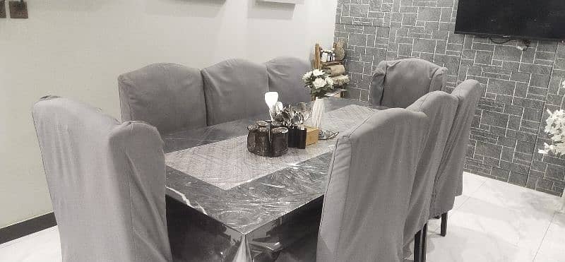 8 seater dining table with seat covers 3