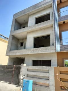 Grey Structure 
A Centrally Located House Is Available For sale In Lahore