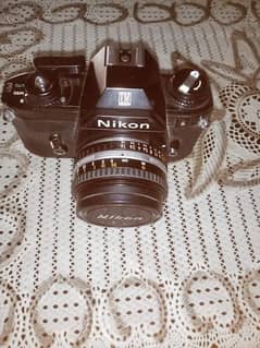 Nikon EM 35mm slr