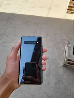 samsung s10+5g    10/9.5 condition water pack