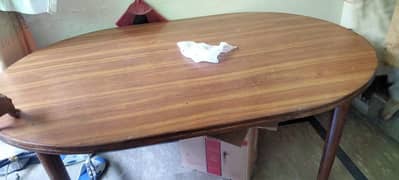A dining table with fine wood is for sale