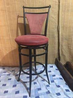 pair of revaluing bar chairs