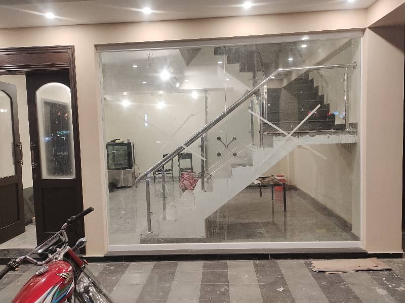 1 KANAL GROUND & FIRST FLOOR FOR RENT ON MAIN ROAD OPP UCP 1