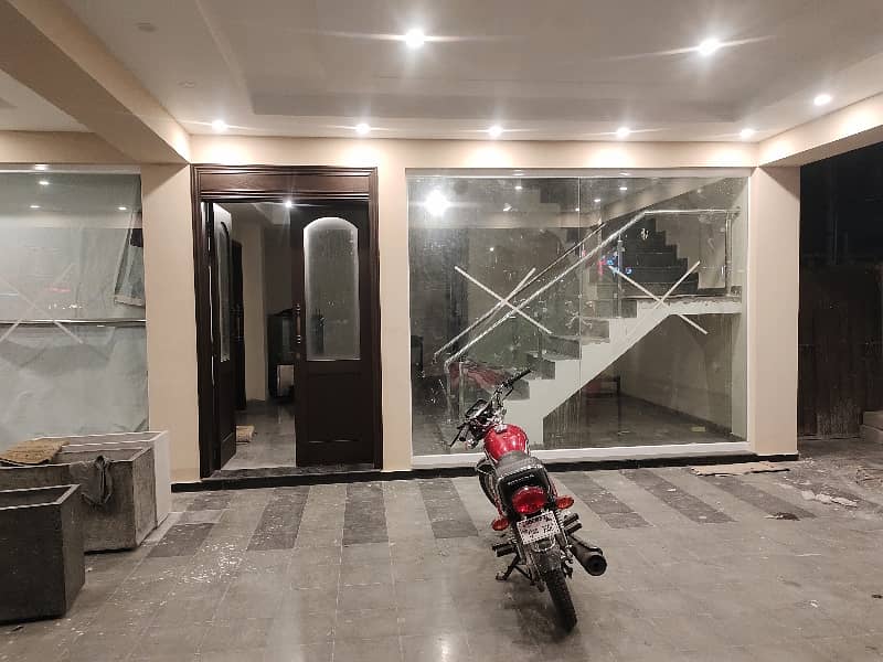 1 KANAL GROUND & FIRST FLOOR FOR RENT ON MAIN ROAD OPP UCP 4