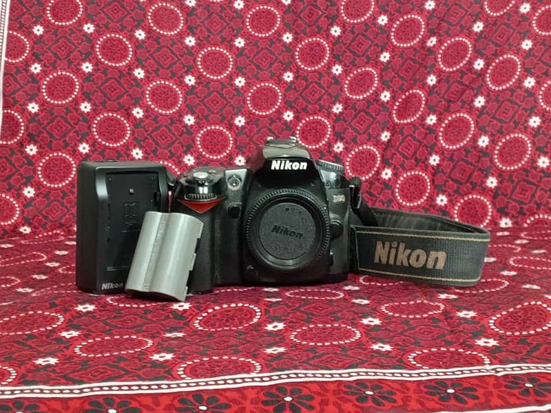 Nikon D90 DSLR camera. 0