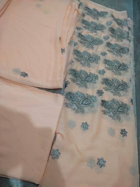 2 piece and 3 piece unstitched Brand new Embroidered Organza dressess 7