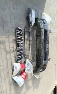 prado 2012 model total genuine bumper+head light+back ligt+bonut+bumpr