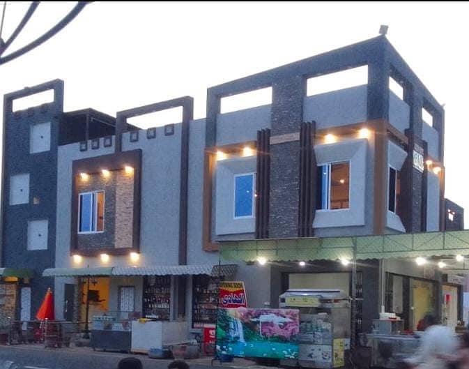 A new purpose built corner building at main Chiniot Road at the top location of Civic Avenue commercial market. 0