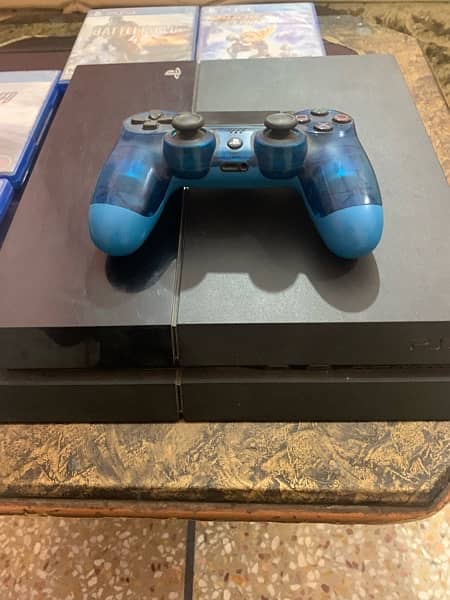 PS4 with console and 4 games cd 0