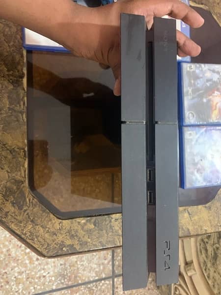 PS4 with console and 4 games cd 3