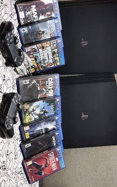 Two  PS4 pro 1 Tb buy one get one free , 2 controllers and 8 games CDs 1