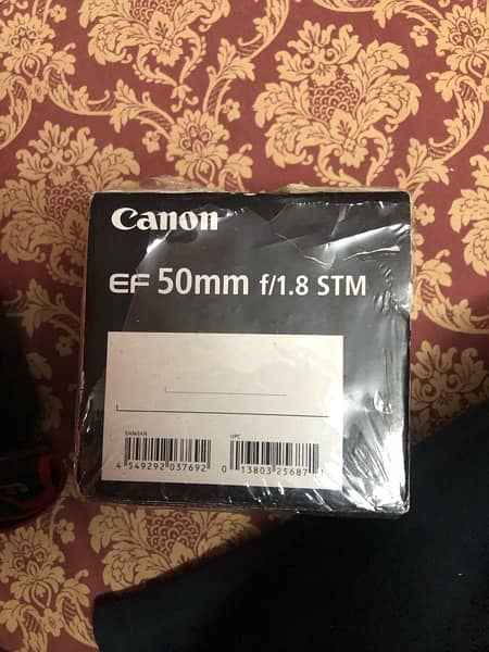50mm canon lens in Steel mold with box & hood 2