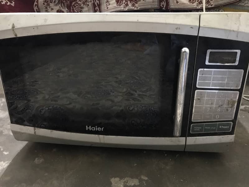 Haier microwave oven condition 10/8 urgent sale 0