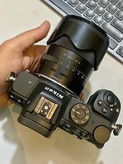 Nikon Z5 + Viltrox 50mm 1.8 + nikon SB-700