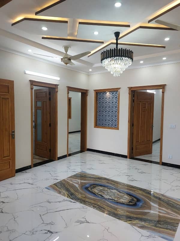 G13 Islamabad 30x60 house South open tile flooring very ideal location on 50 feet road

 Double storey double unit 

5 bed 

6 bath 

2 TV launch 

2 kitchen 

2 Drawing Rooms 

2 cars parking 

boring available

 gas available

 electricity available 4