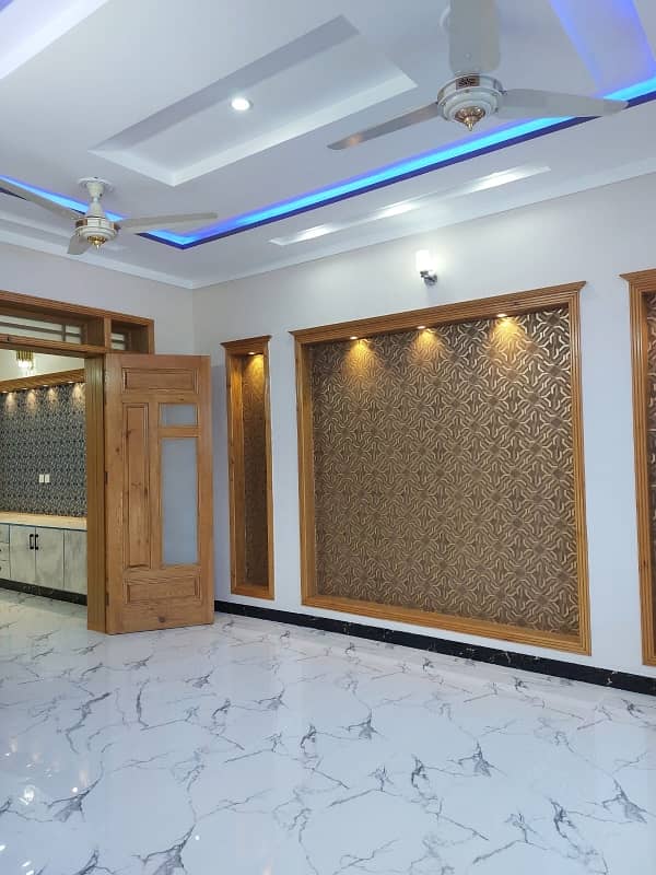 G13 Islamabad 30x60 house South open tile flooring very ideal location on 50 feet road

 Double storey double unit 

5 bed 

6 bath 

2 TV launch 

2 kitchen 

2 Drawing Rooms 

2 cars parking 

boring available

 gas available

 electricity available 6