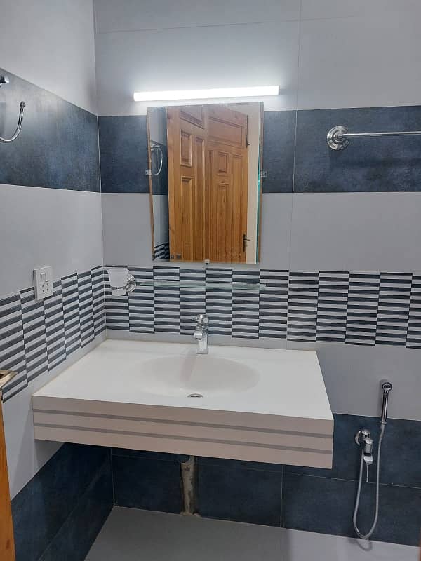 G13 Islamabad 30x60 house South open tile flooring very ideal location on 50 feet road

 Double storey double unit 

5 bed 

6 bath 

2 TV launch 

2 kitchen 

2 Drawing Rooms 

2 cars parking 

boring available

 gas available

 electricity available 15
