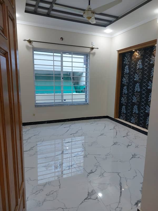 G13 Islamabad 30x60 house South open tile flooring very ideal location on 50 feet road

 Double storey double unit 

5 bed 

6 bath 

2 TV launch 

2 kitchen 

2 Drawing Rooms 

2 cars parking 

boring available

 gas available

 electricity available 23