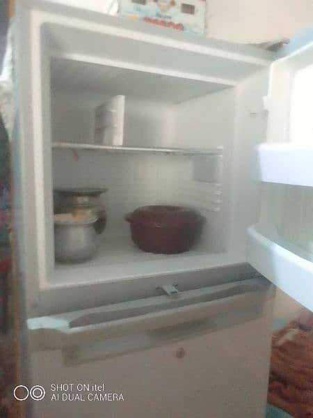 1 full size refrigerator Orient company price 60000 0