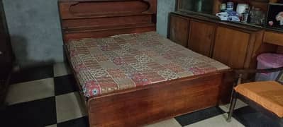 Double bed with matress and side tables