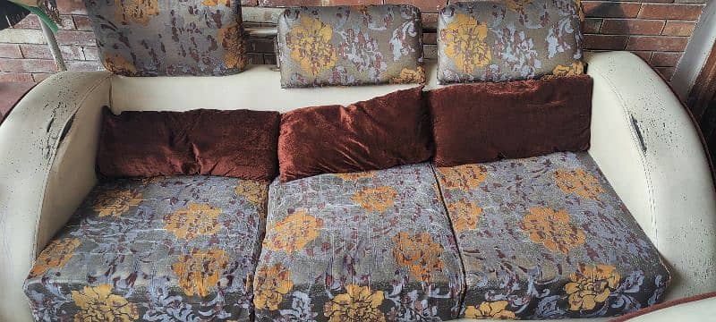 The sofa set is up for sale. 1
