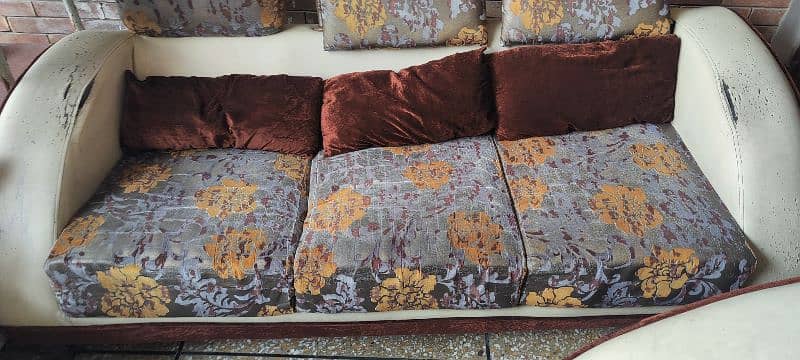 The sofa set is up for sale. 2